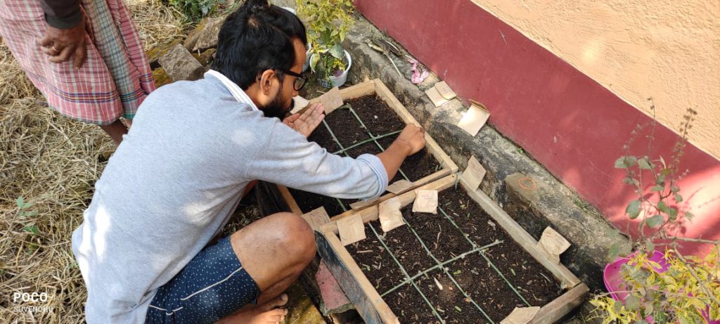 Biman planting seeds