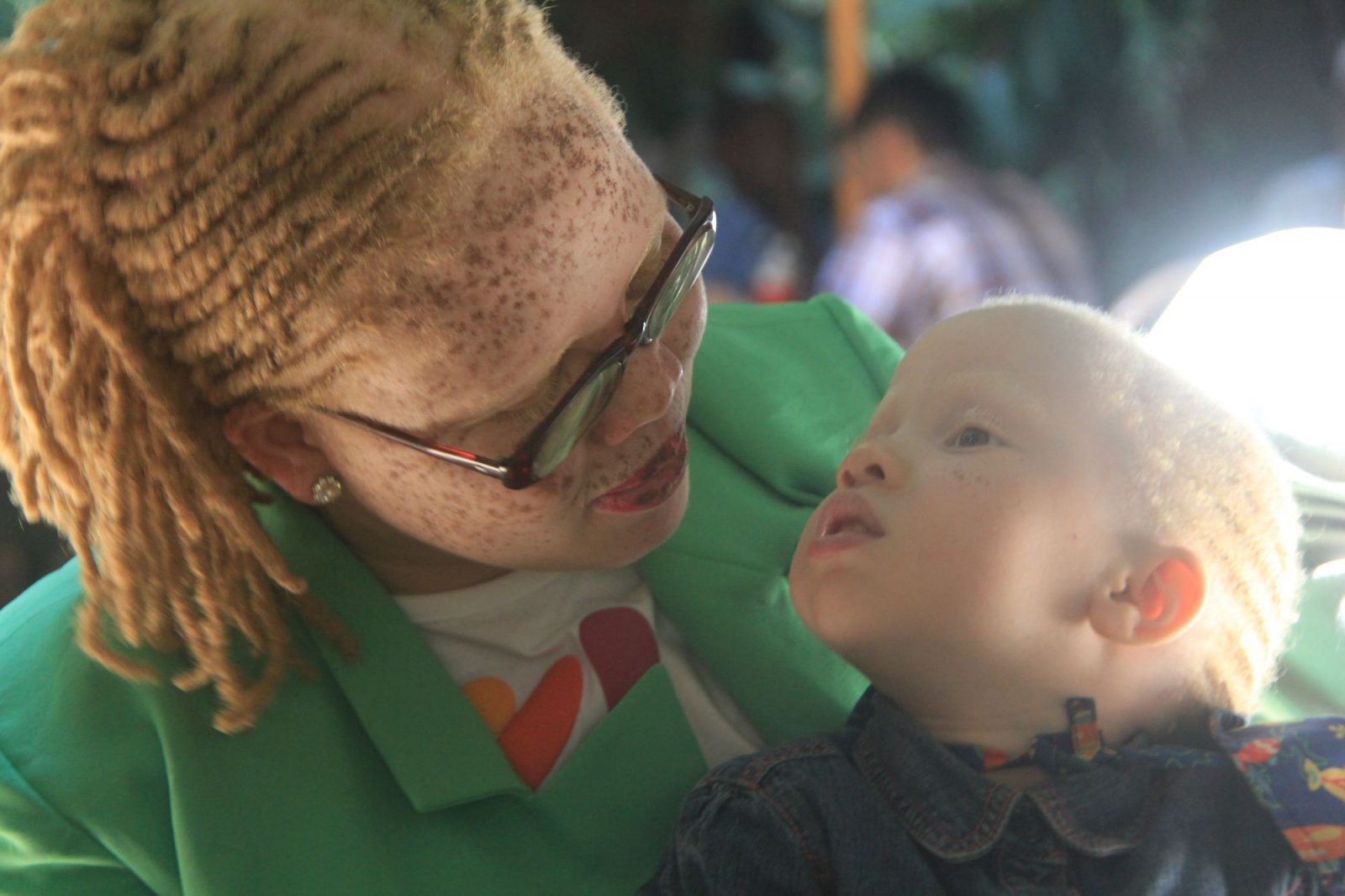 Jayne waithera, founder of Positive Exposure Kenya with one of her beneficiaries