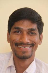 smiling image of Raja KR