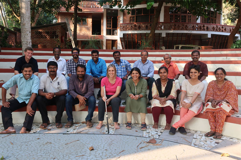 2019 kanthari annual meeting Group picture of kanthari staff sitting on amphitheatre posing for picture and all are smiling
