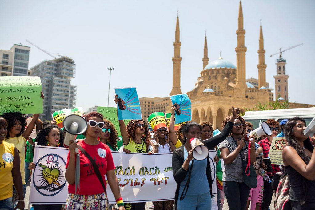 Rahel Zageye leading a demonstration advocating for the rights for domestic migrant workers in Lebanon
